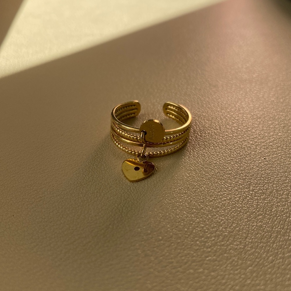 Adjustable Ring With Two Small Charms - image 1
